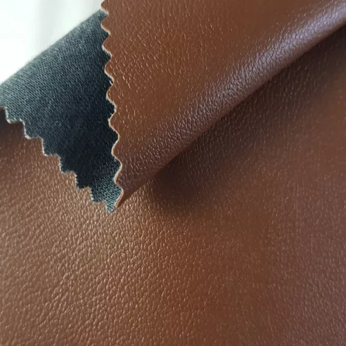 Non Plus 327 - Mackóbarna, extrém kopásállóságú, fertőtleníthető, színes prémium textilbőr 