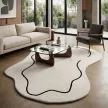 LOOP Ivory, ekrü színű gyapjú szőnyeg szabálytalan kontúrral, 200x300 cm